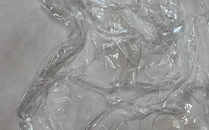 Close up of an Enki disposable hair cutting cape.