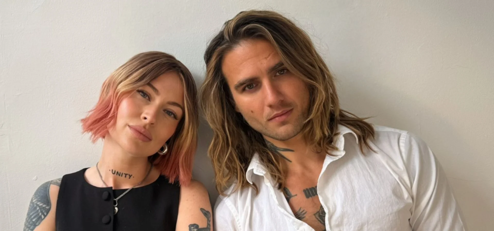 Portrait of Lydia Wolfe and Jack Mead of Jack & the Wolfe, showcasing contemporary hair artistry, creative talent and modern salon education.