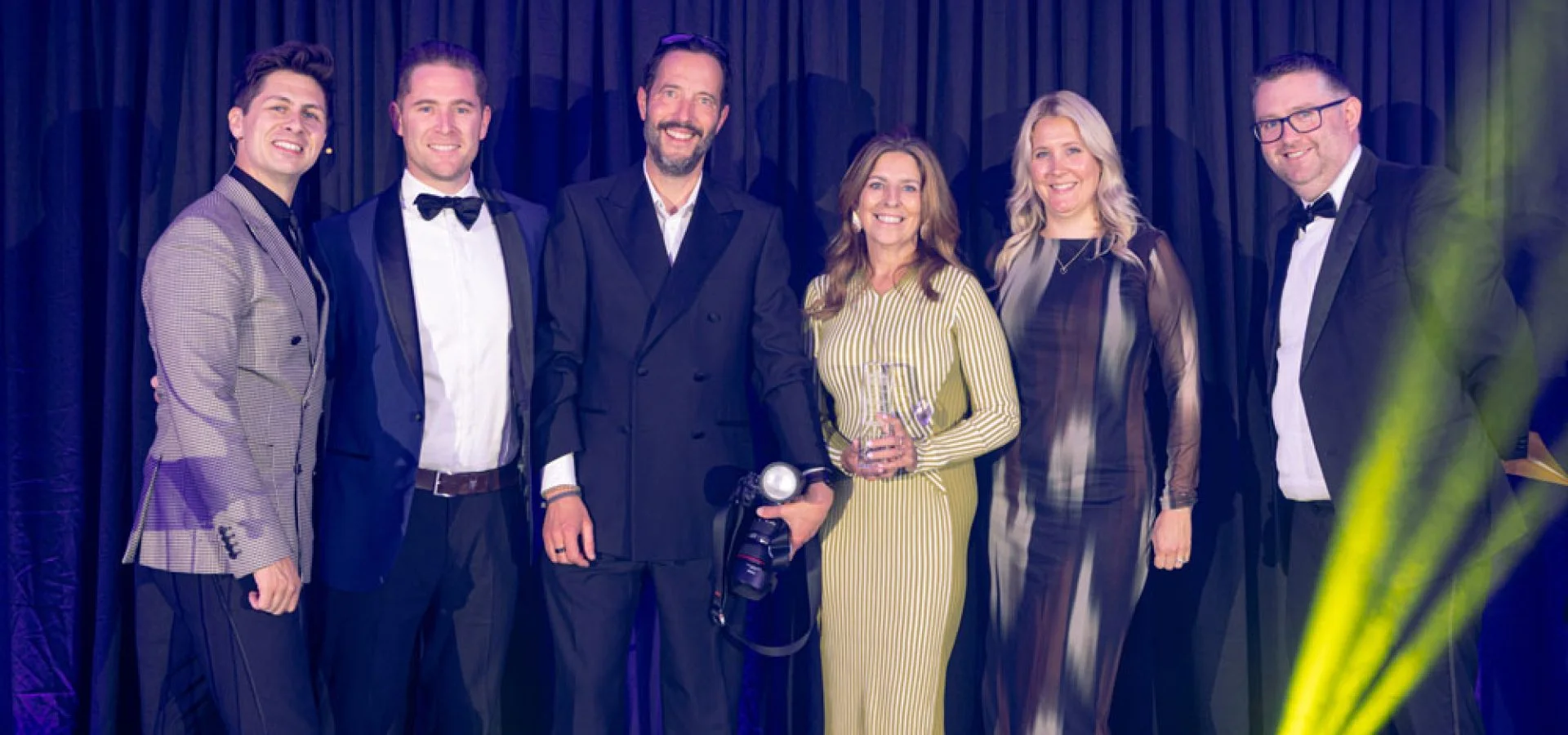 Q Hair and Beauty team celebrate winning the Large Business Award at the Chichester and Bognor Business Awards ceremony.