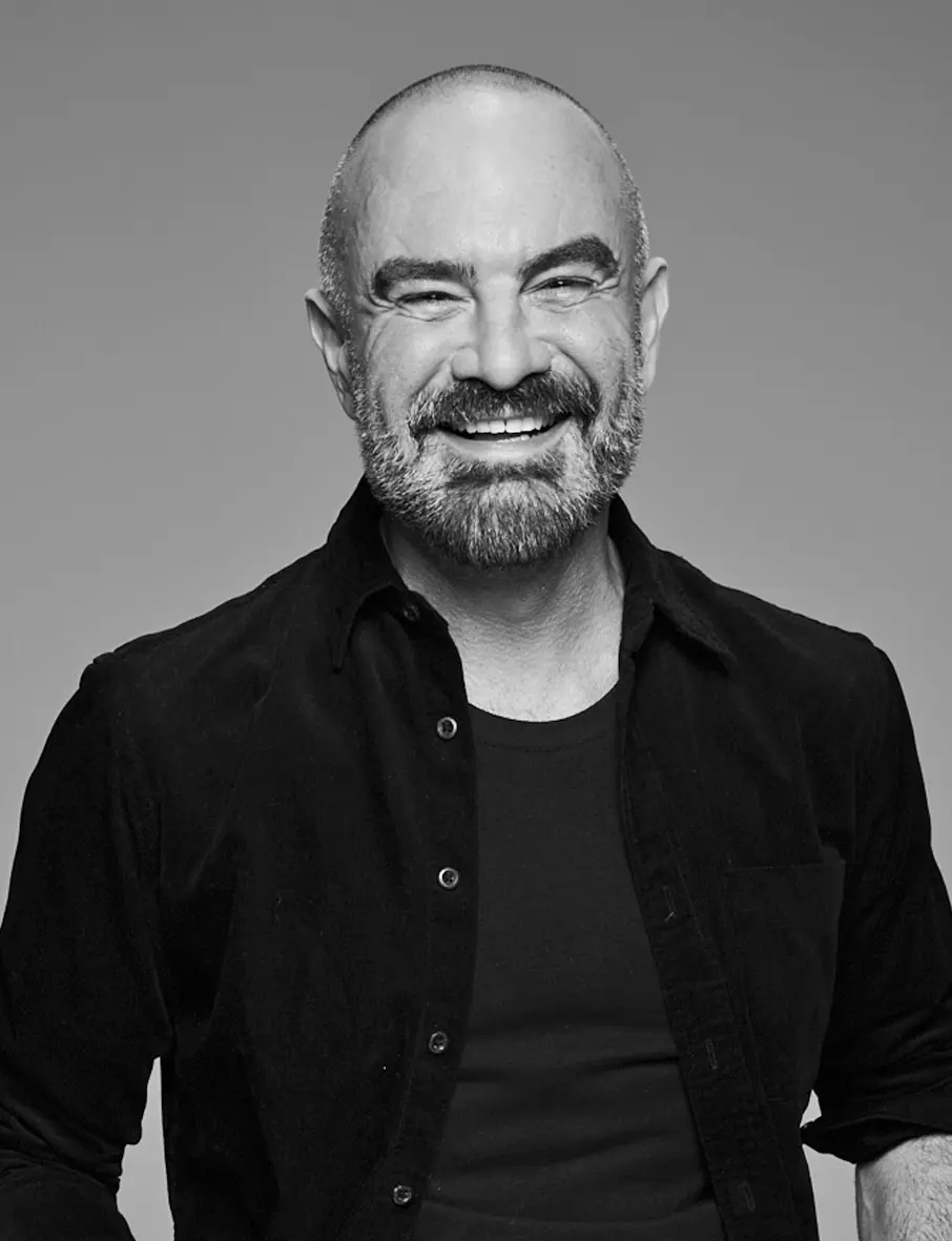 A black and white photo of hairdresser Andrew Barton.