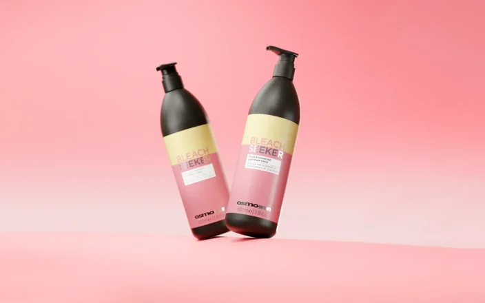 Two OSMO IKON Bleach Seeker colour-changing shampoo bottles for removing bleach residue before blonde toning.