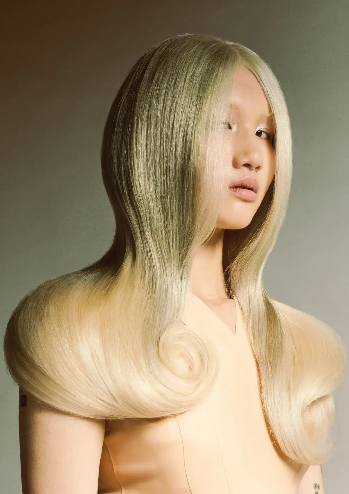 Butchers Tender Gravity collection featuring sculptural platinum hair with soft curves and precision editorial styling.