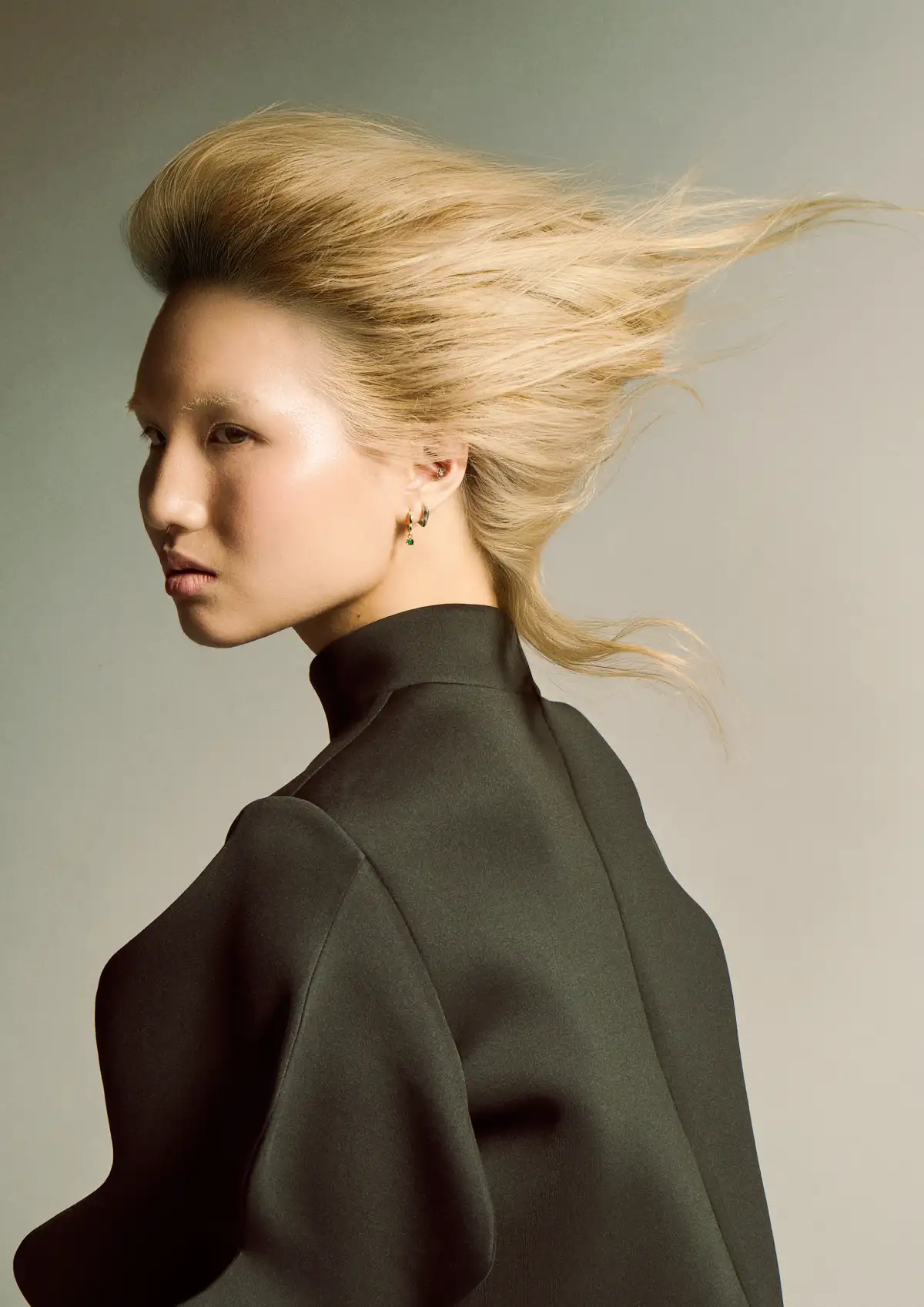 Butchers Tender Gravity collection featuring sculptural blonde hair with fluid movement and refined editorial styling.