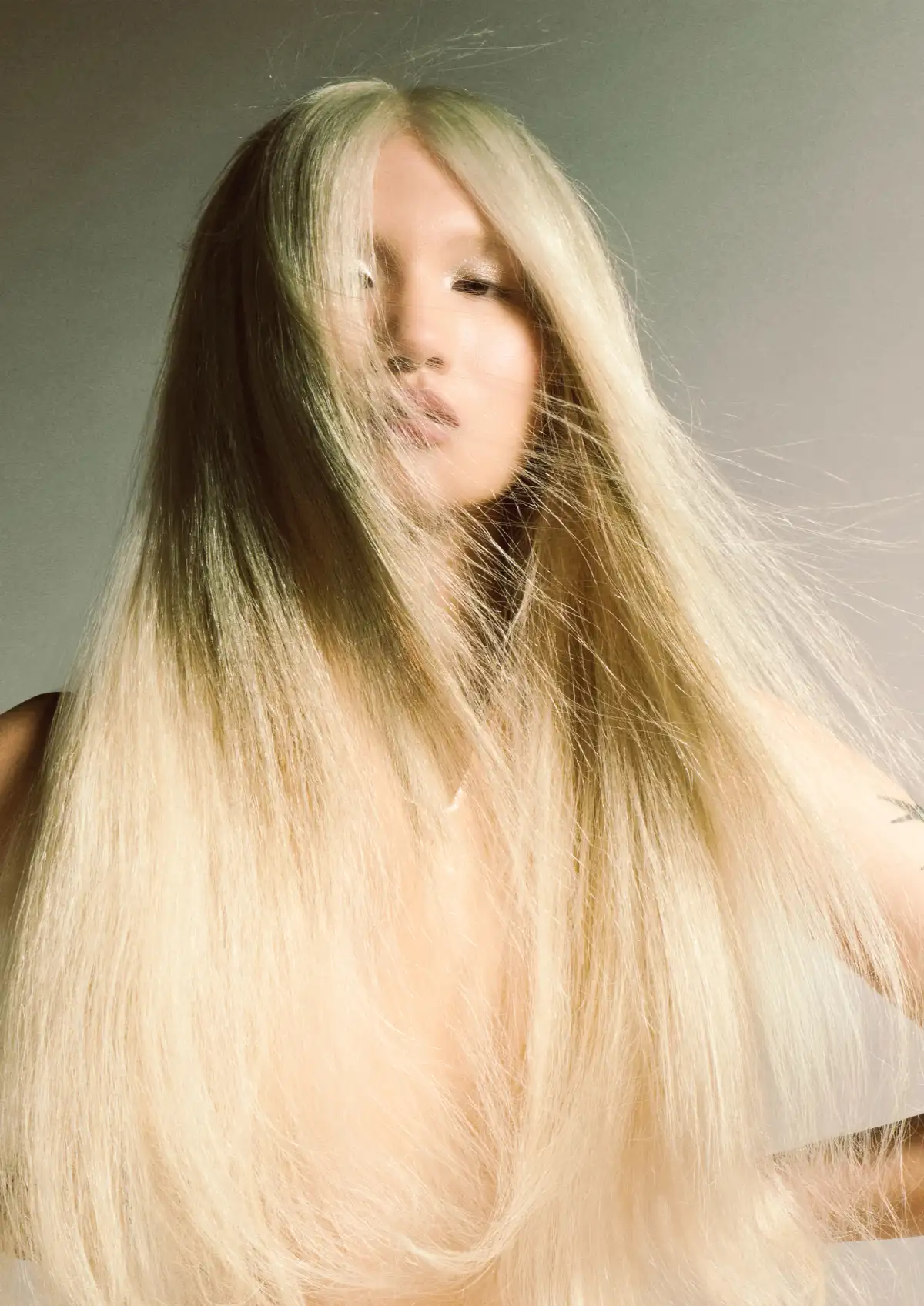 Butchers Tender Gravity collection featuring flowing platinum hair with sculptural softness and editorial styling.