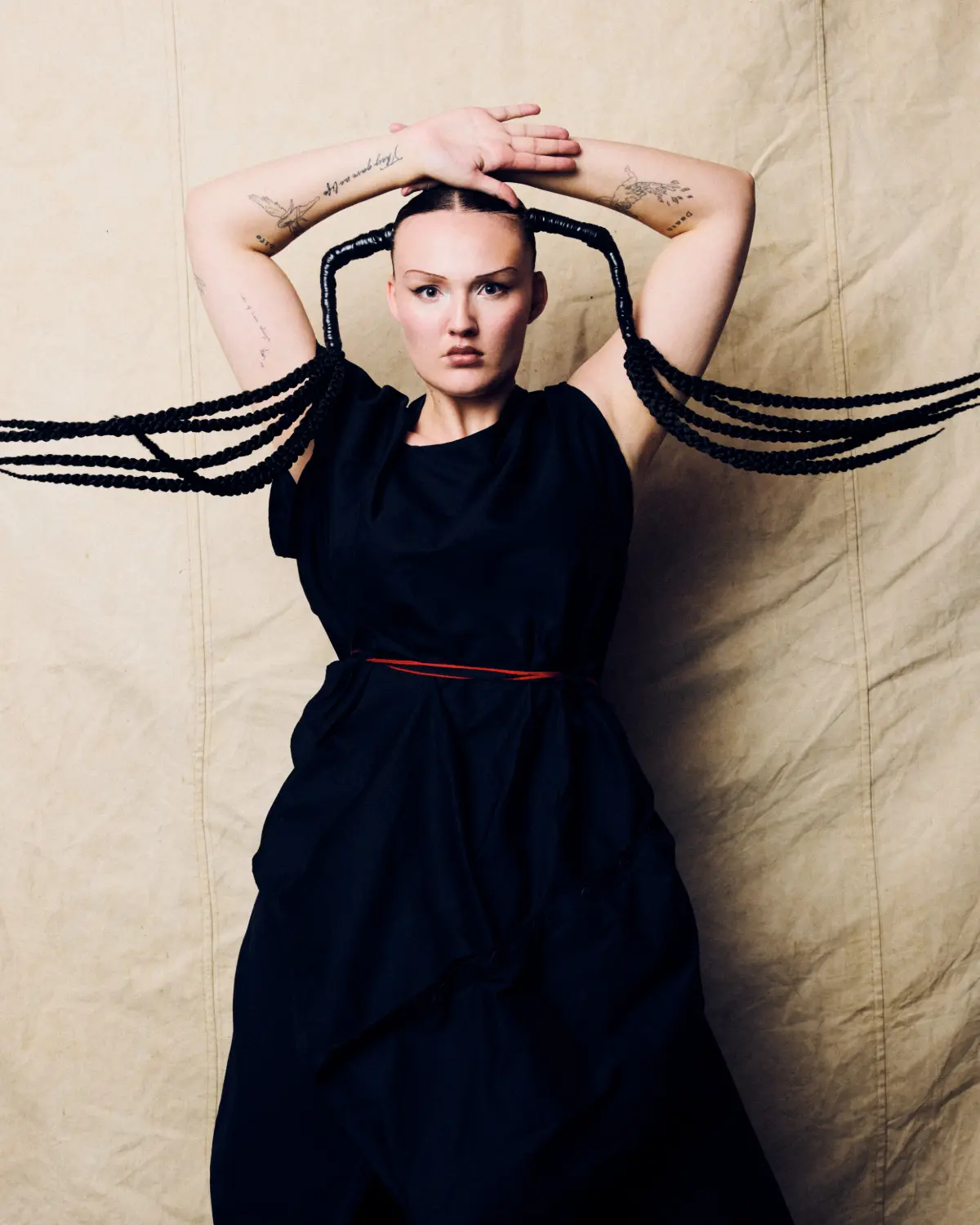 Project Scotland 2026 avant-garde braided hairstyle featuring sculptural cable braids and precision editorial styling.