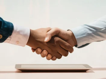 James Ashton shakes hands with HB Collective after agreeing to become Commercial Director