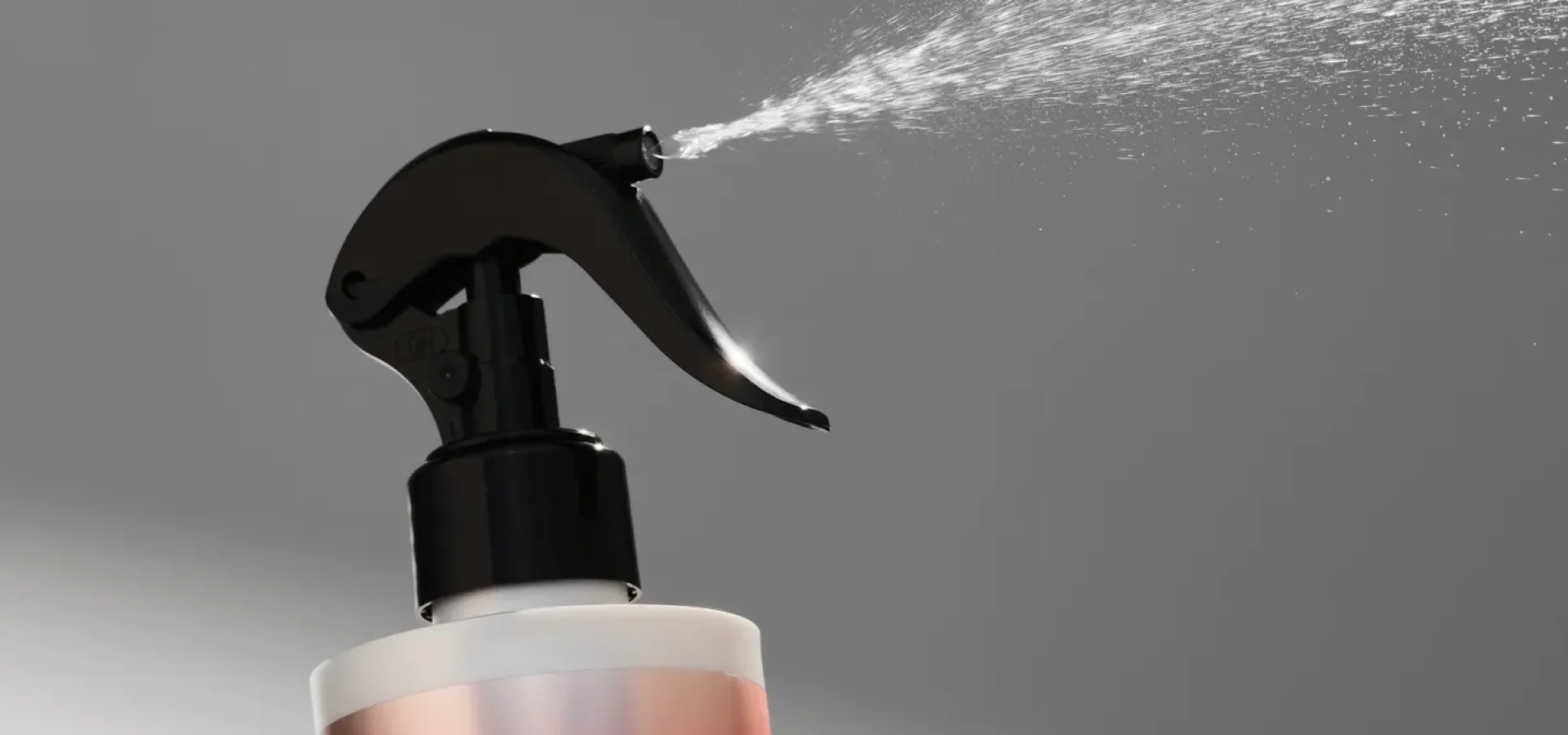 JOICO Dream Blowout Glass frizz-fighting spray bottle with fine mist, designed for smooth, glossy blow-dry results.