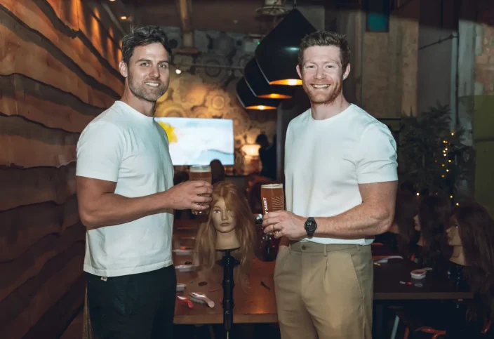 Dad’s Mathew Carter and Lawrence Price drink a pint at an event by The Secret Life of Dads podcast.