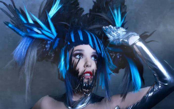 Model with blue and black headdress from from the collection 'ANGELS’ by William and Norma Gray.