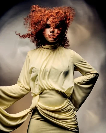 Alex Thaddeus Tempest Collection featuring voluminous copper curls styled to capture movement through the atmosphere.