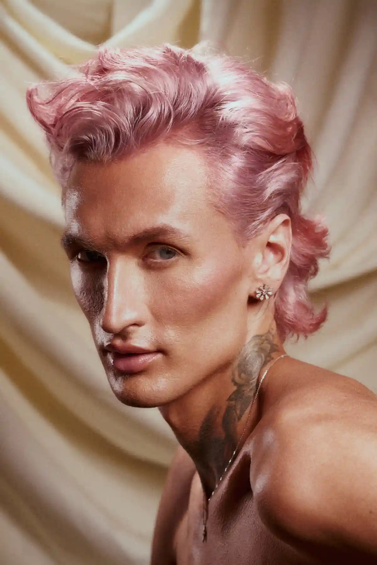 Model with shirt pink hair from the Archangels collection by Grant Carr.