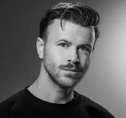A black and white photo of Josh Lamonaca.