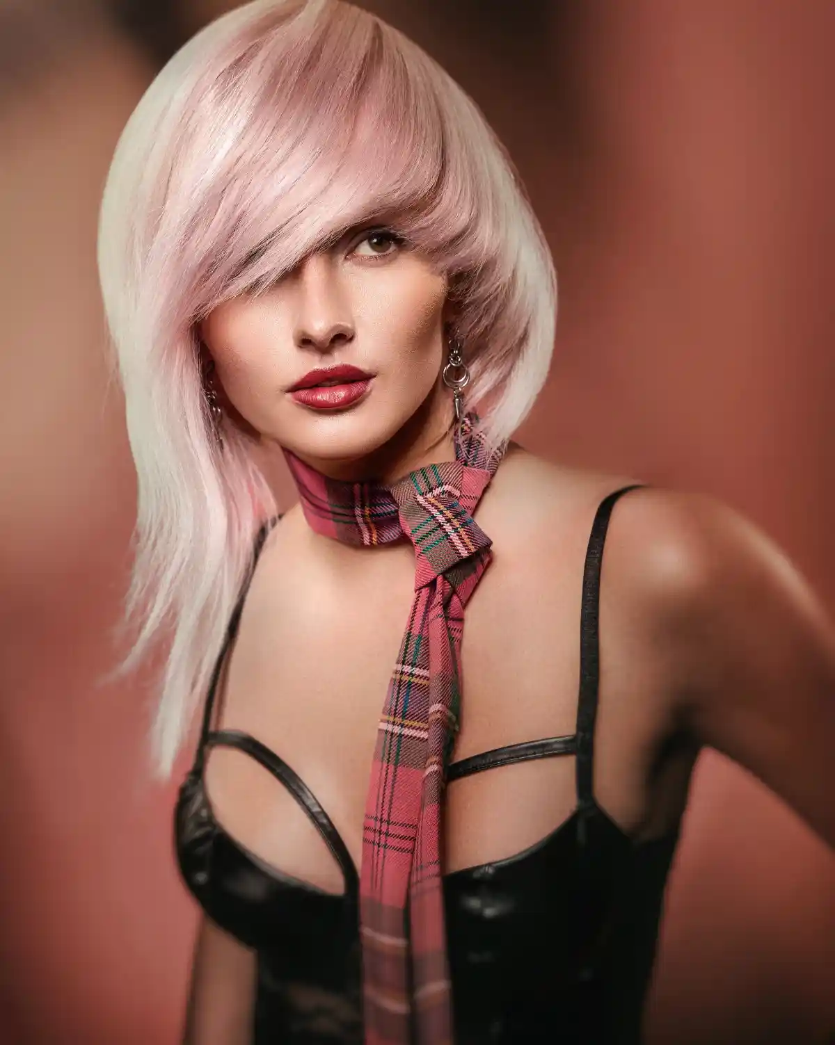 A model with sleek, glossy hair that is set to make a strong return for autumn/winter.