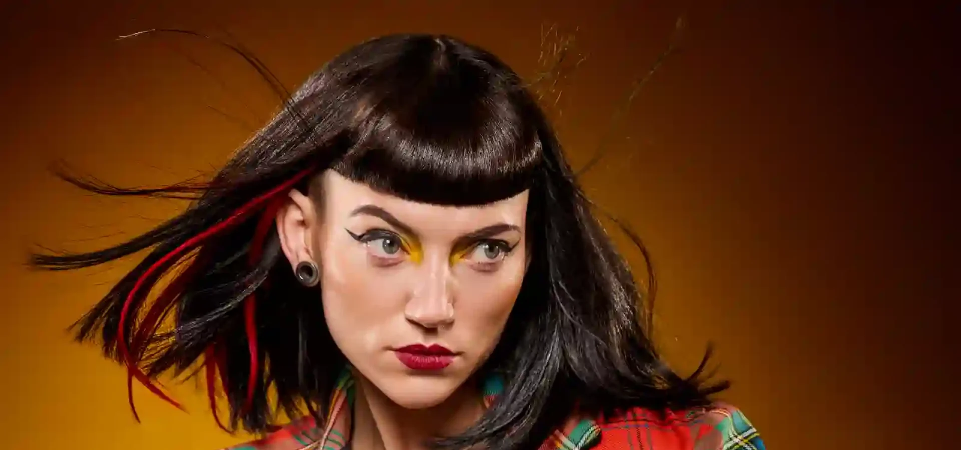 Model with a Micro fringe that is making a return for AW.