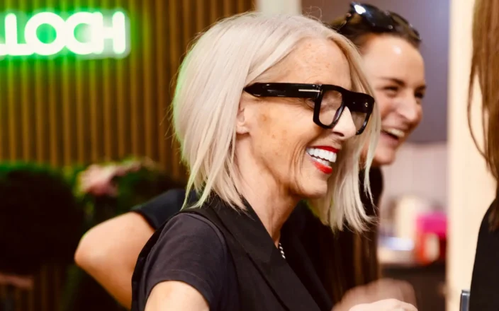 Side shot of Marlene Lamont at an event.