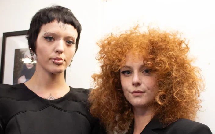 Two hair models pose for the camera as Sassoon Future Creatives Inspire at Charity Showcase