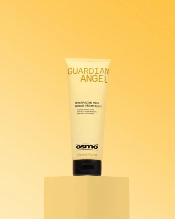 A bottle of OSMO Guardian Angel Hair Mask in branded packaging on a yellow backdrop.
