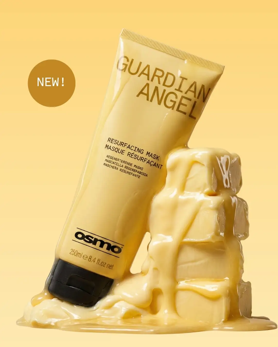 A bottle of OSMO Guardian Angel Hair Mask in branded packaging on a yellow backdrop next to butter melting.