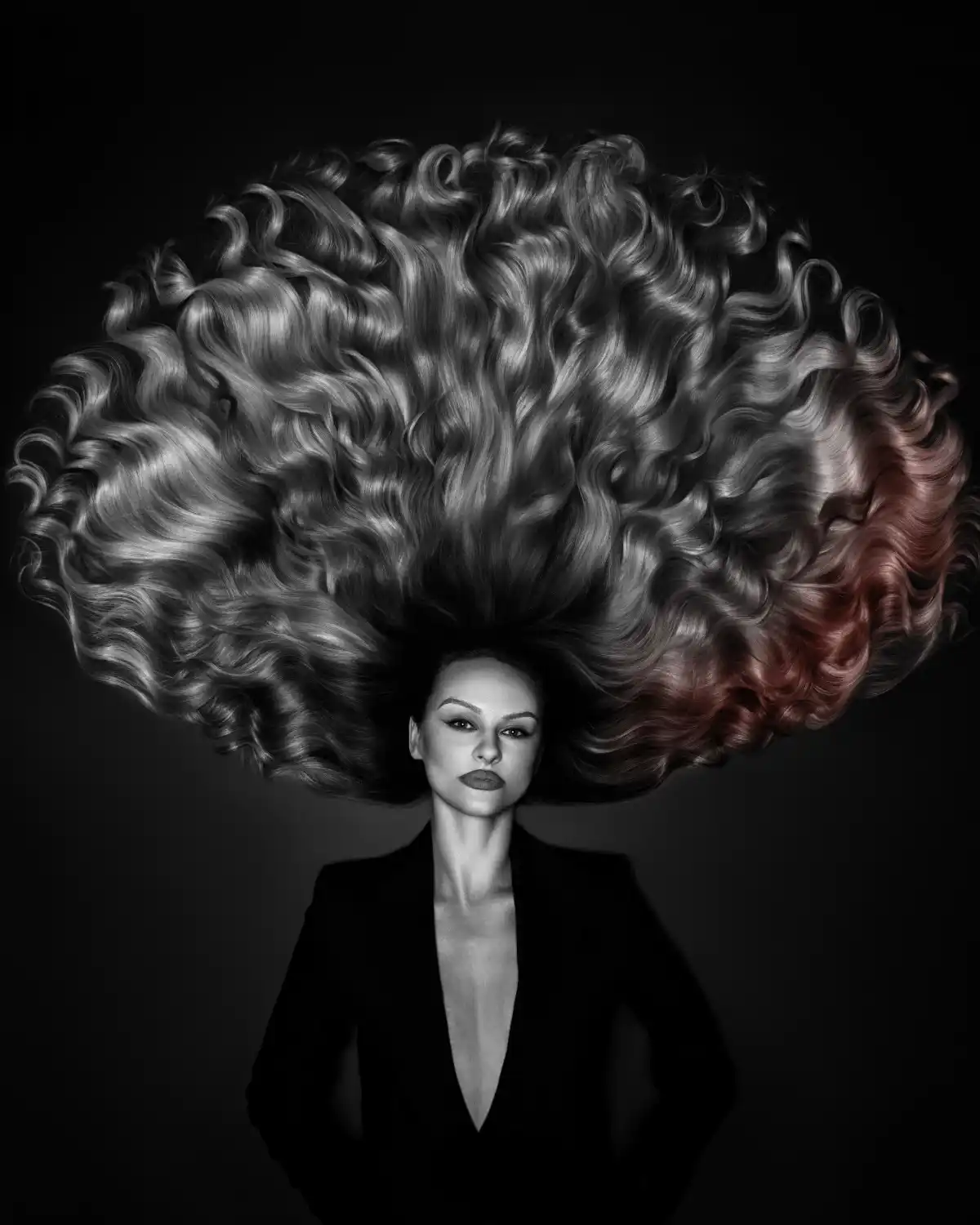 Voluminous sculptural curls with subtle red accents from Niall McNulty's Accent Collection, celebrating shape, contrast and simplicity.