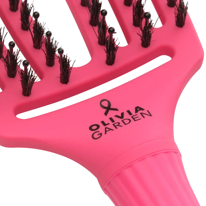 Close up of Olivia Garden pink finger-brush in support of breast cancer awareness.