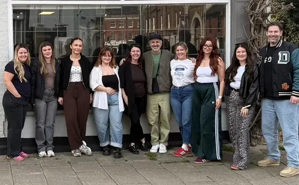 Pare Hair team stand outside the salon's window for a photo.