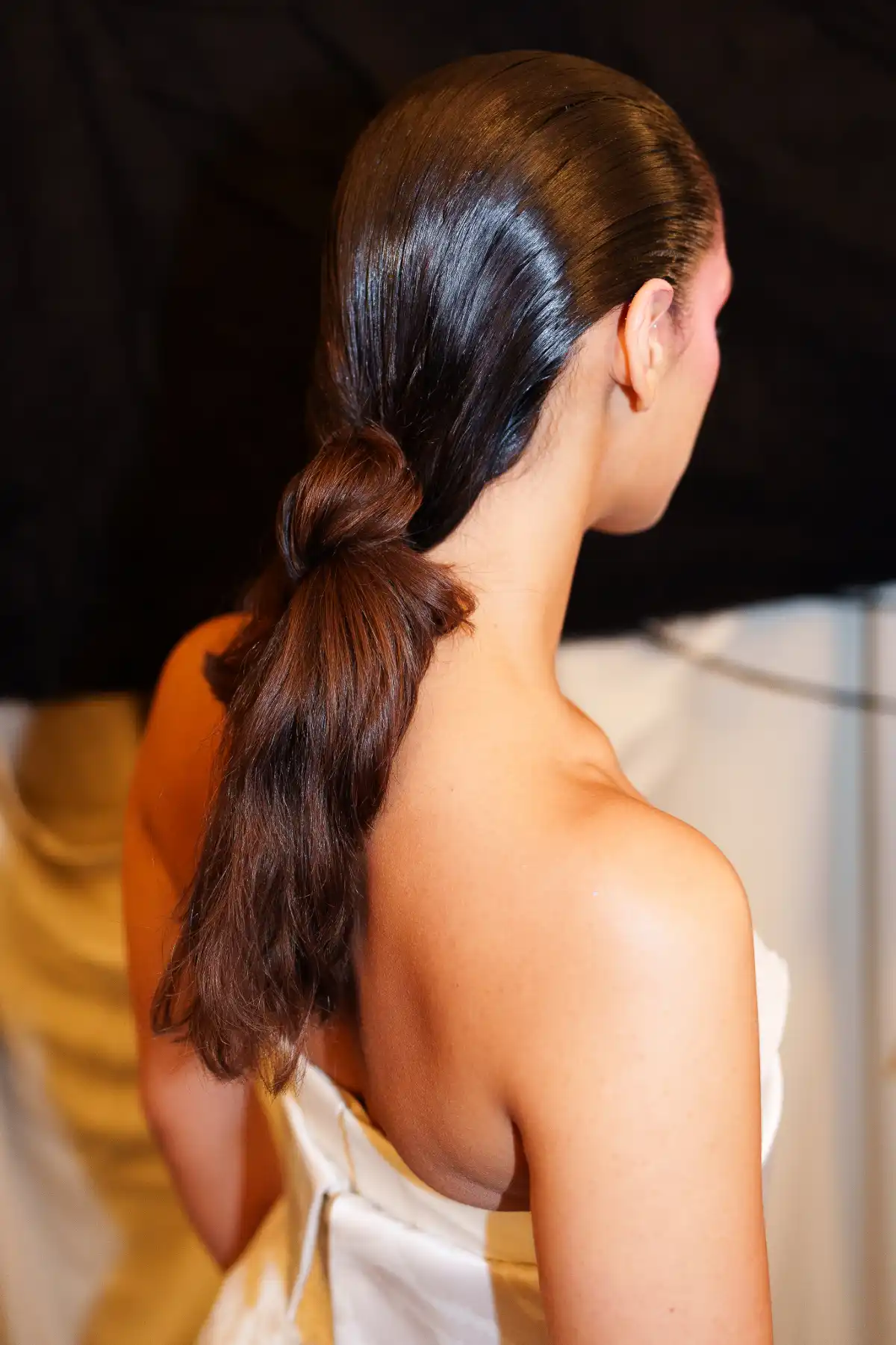 Model with the new low pony at LFW by Harris Reed.