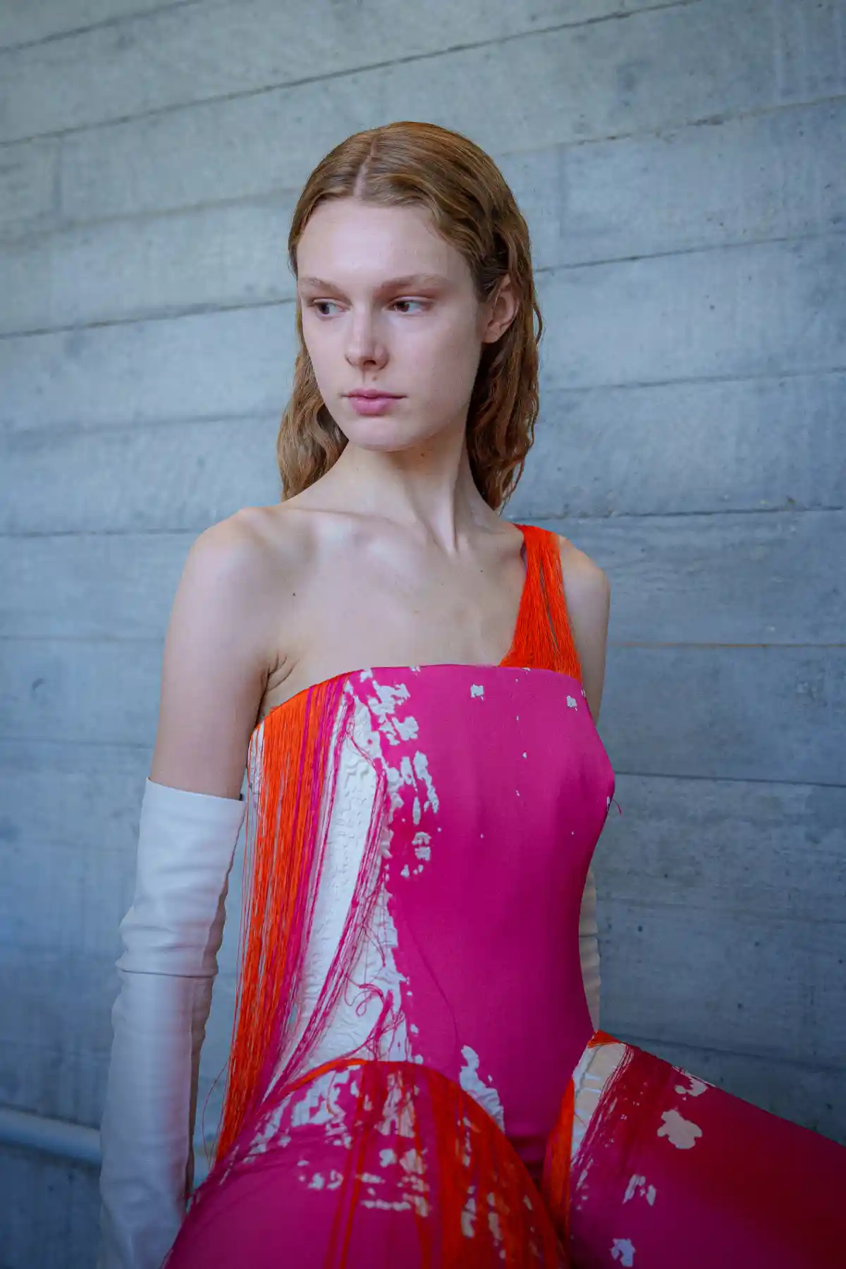 Model with long wavy hair at ROKSANDA SS27 LFW.
