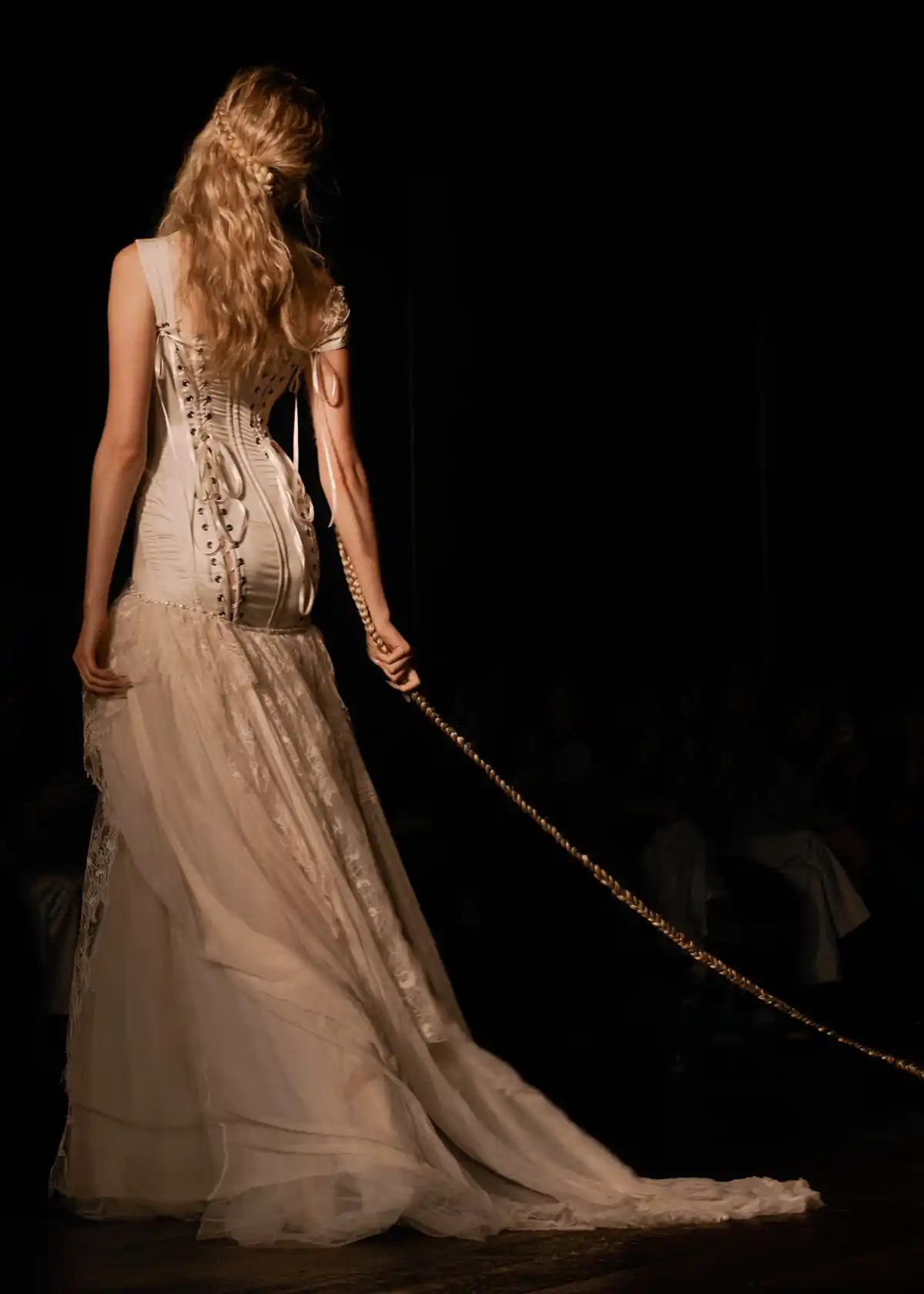 Model with long blonde tousled hair at LFW DREAMING ELI SS27.