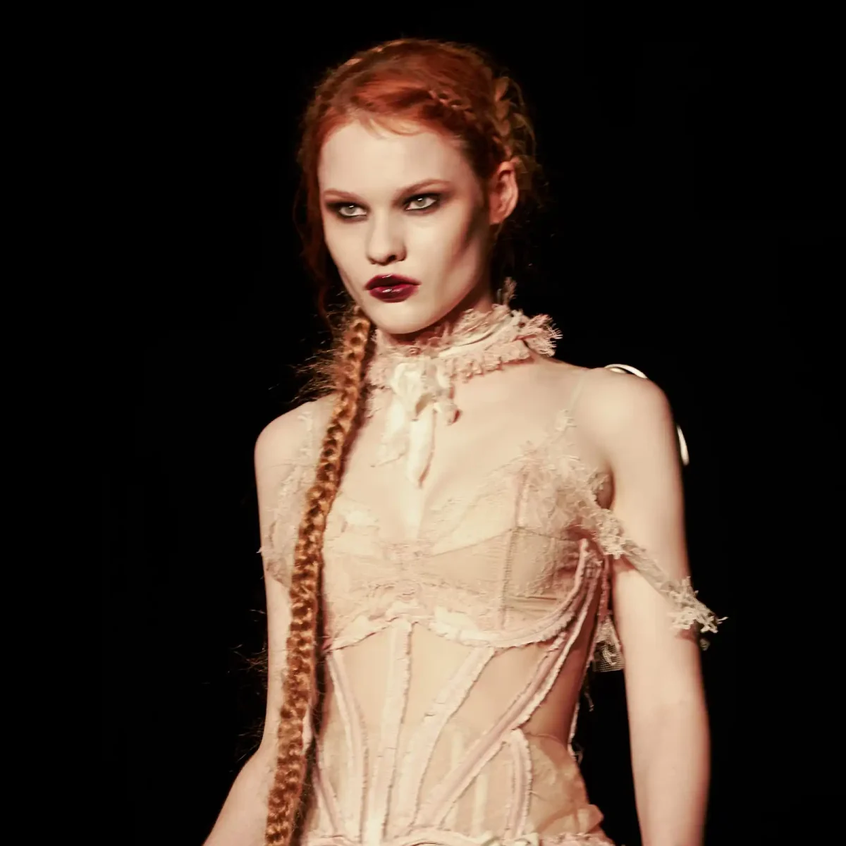 Model with very long ginger braid at LFW DREAMING ELI SS27.