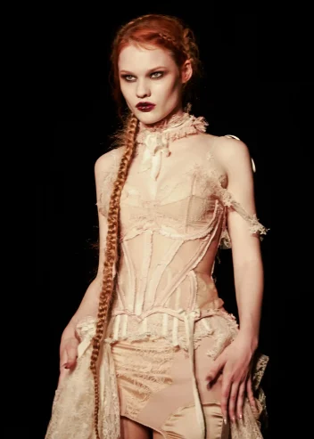 Model with very long ginger braid at LFW DREAMING ELI SS27.