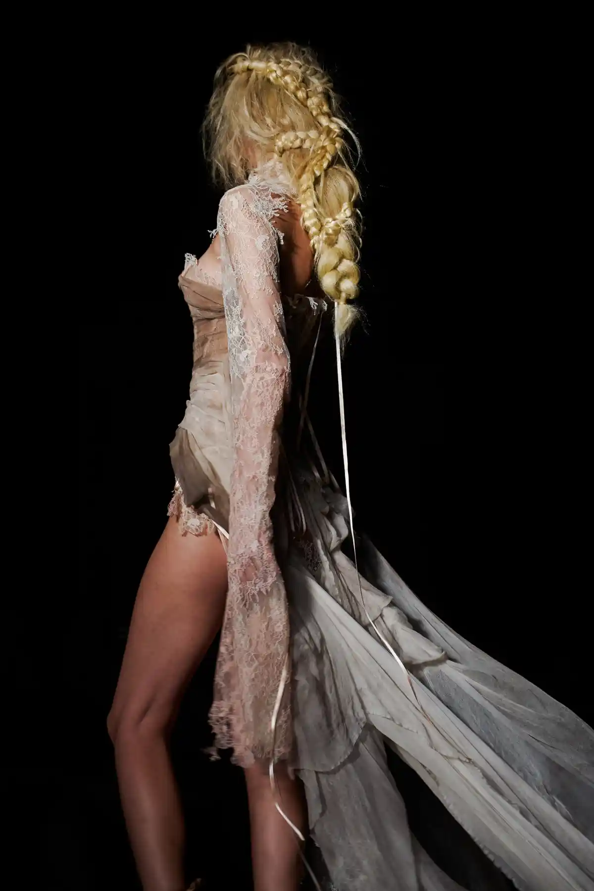Model with tousled blonde braid at LFW DREAMING ELI SS27.