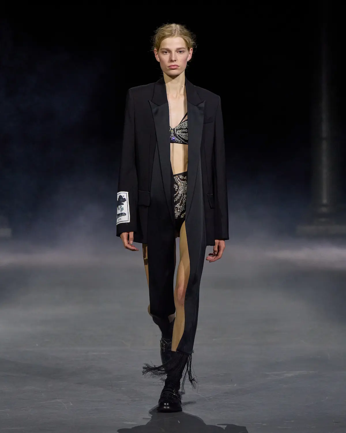 Blonde model walks the catwalk at Erdem SS27.