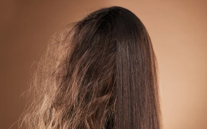 Long brown damaged hair.