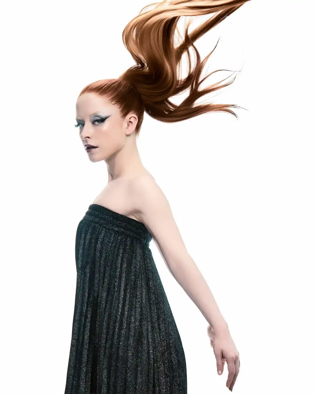 Chris Grimley’s Motion collection featuring a sculptural high ponytail with flowing, dynamic movement and sleek, polished texture.