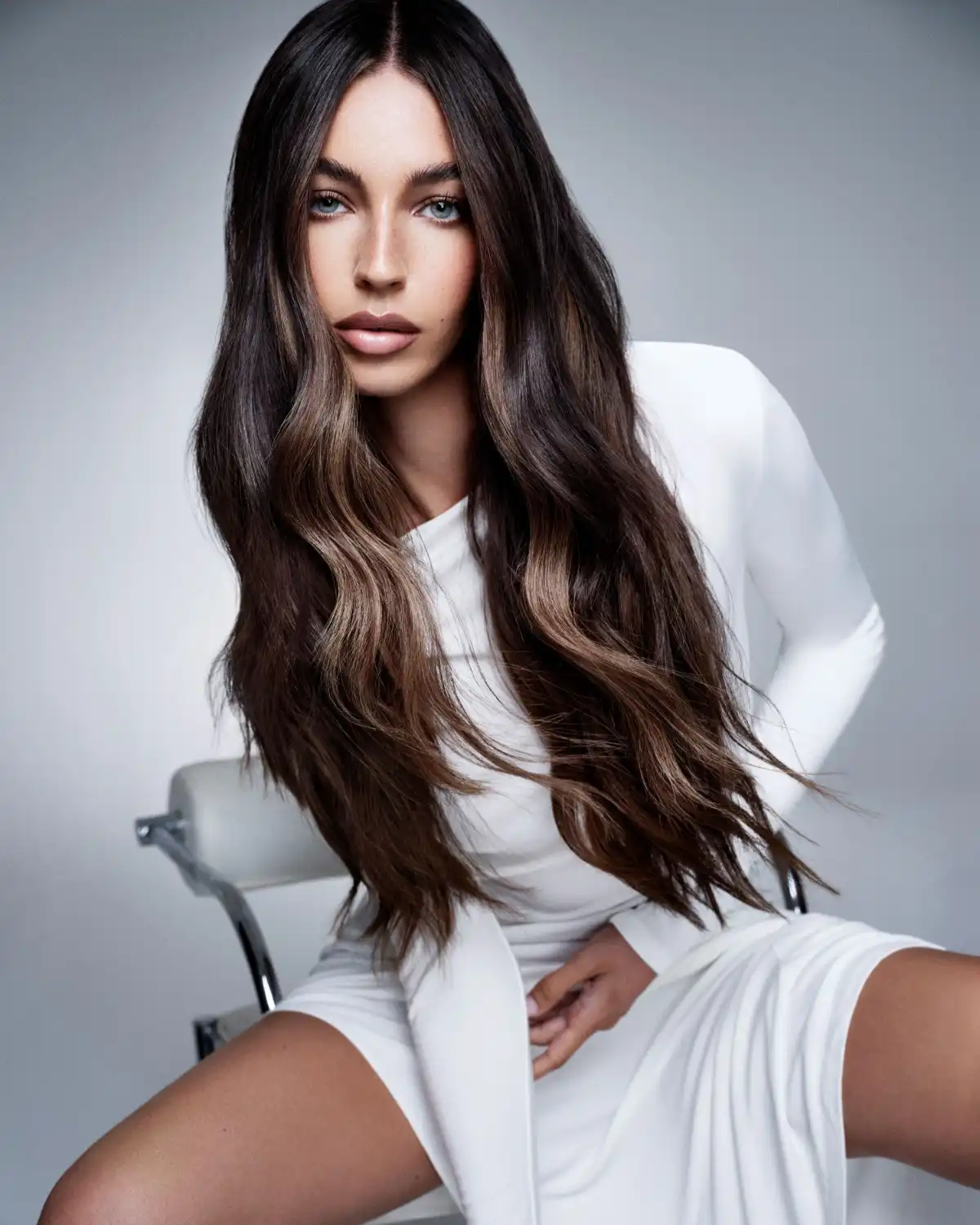 Brunette model with with remi cachet babylights.