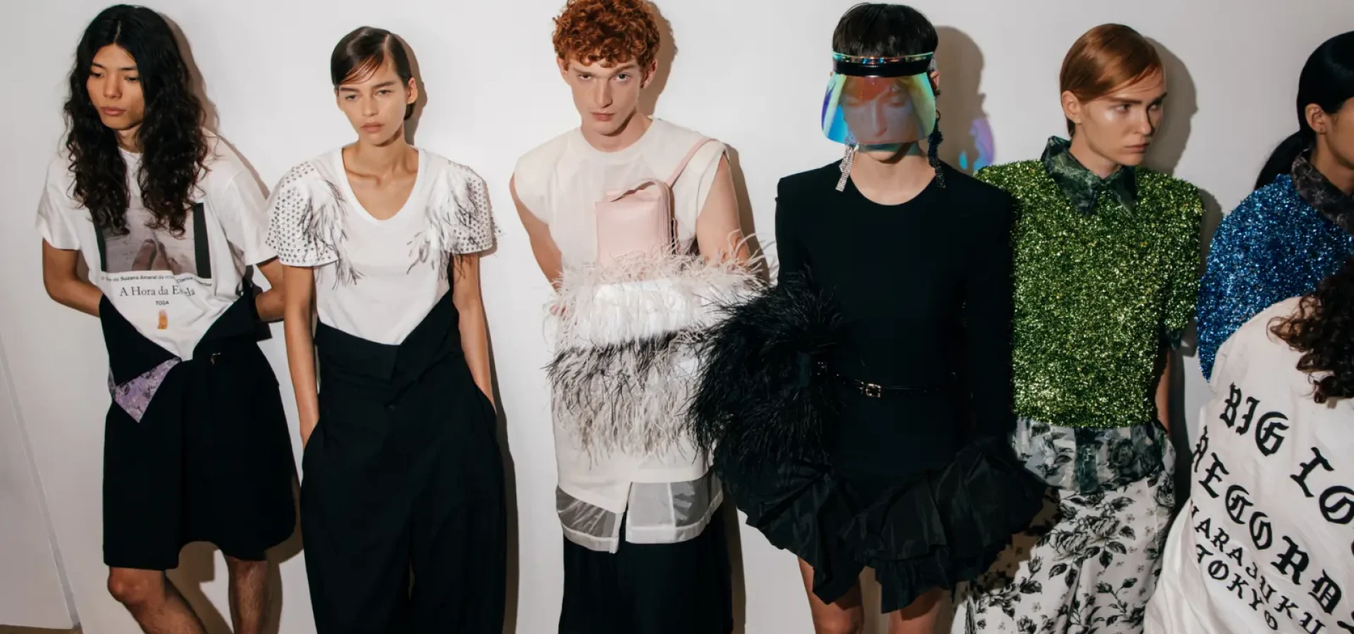 Models with hair by Bumble and bumble line up at LFW Toga SS27 show.