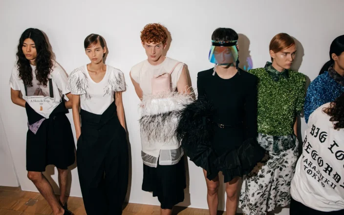 Models with hair by Bumble and bumble line up at LFW Toga SS27 show.