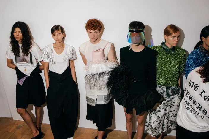Models with hair by Bumble and bumble line up at LFW Toga SS27 show.