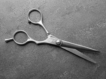 scissors on a concrete background