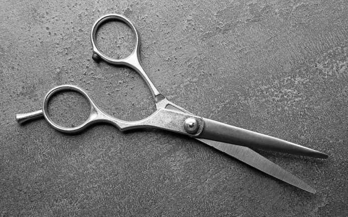 scissors on a concrete background