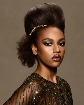 Afro-textured sculptural updo with gold adornment from Chris Grimley’s Future Ancestry collection.