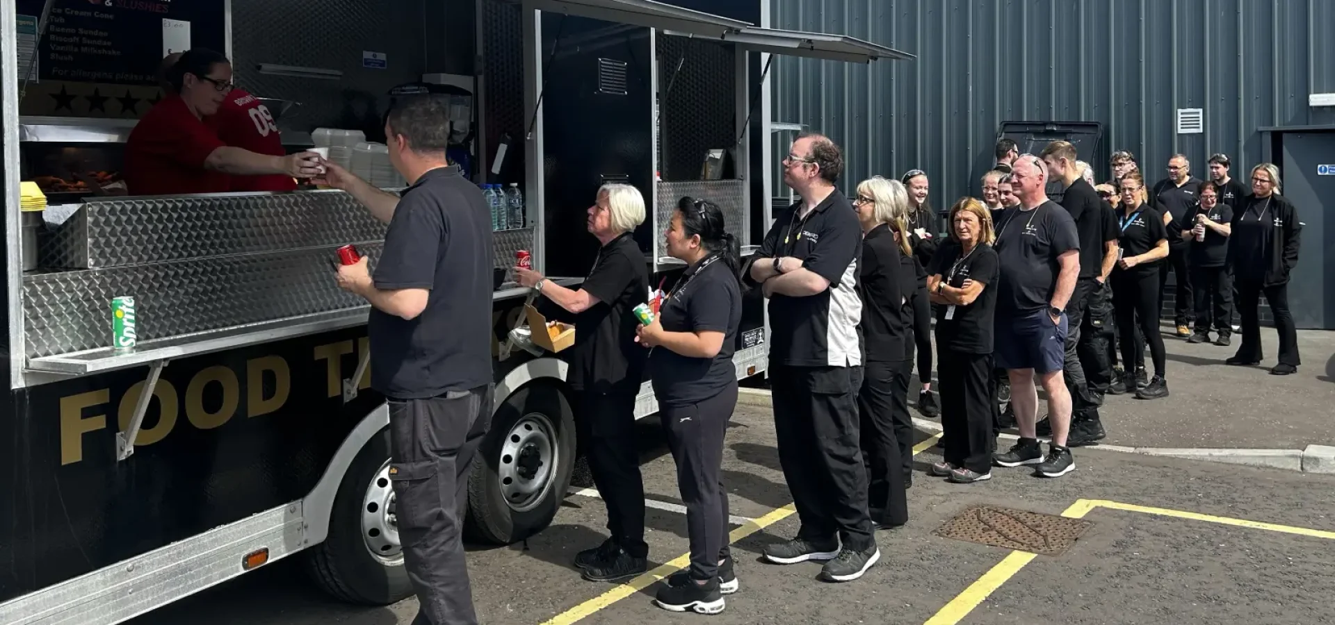 Staff at a fish and chips van at Denman headquarters
