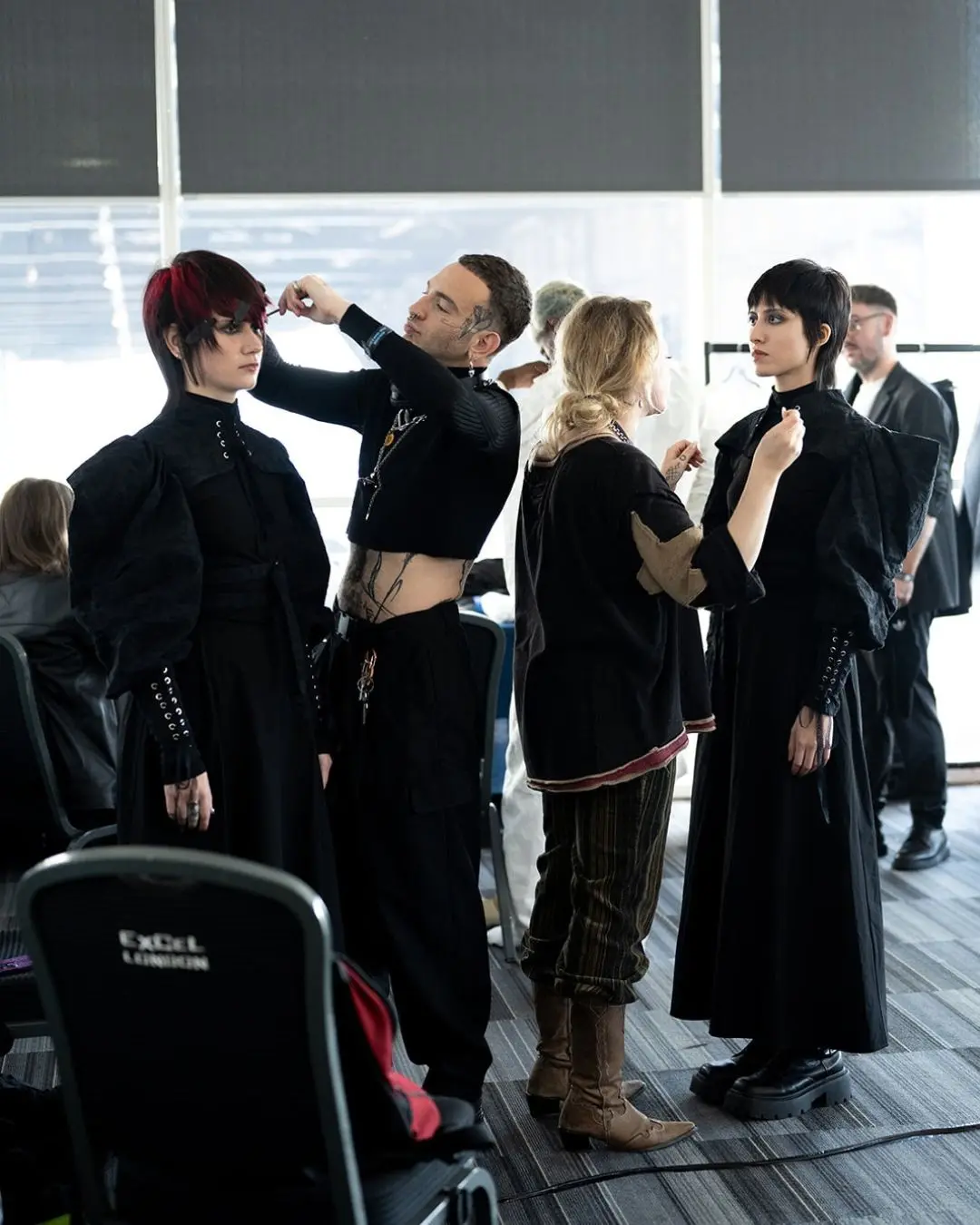 Stylist working backstage at Salon International.