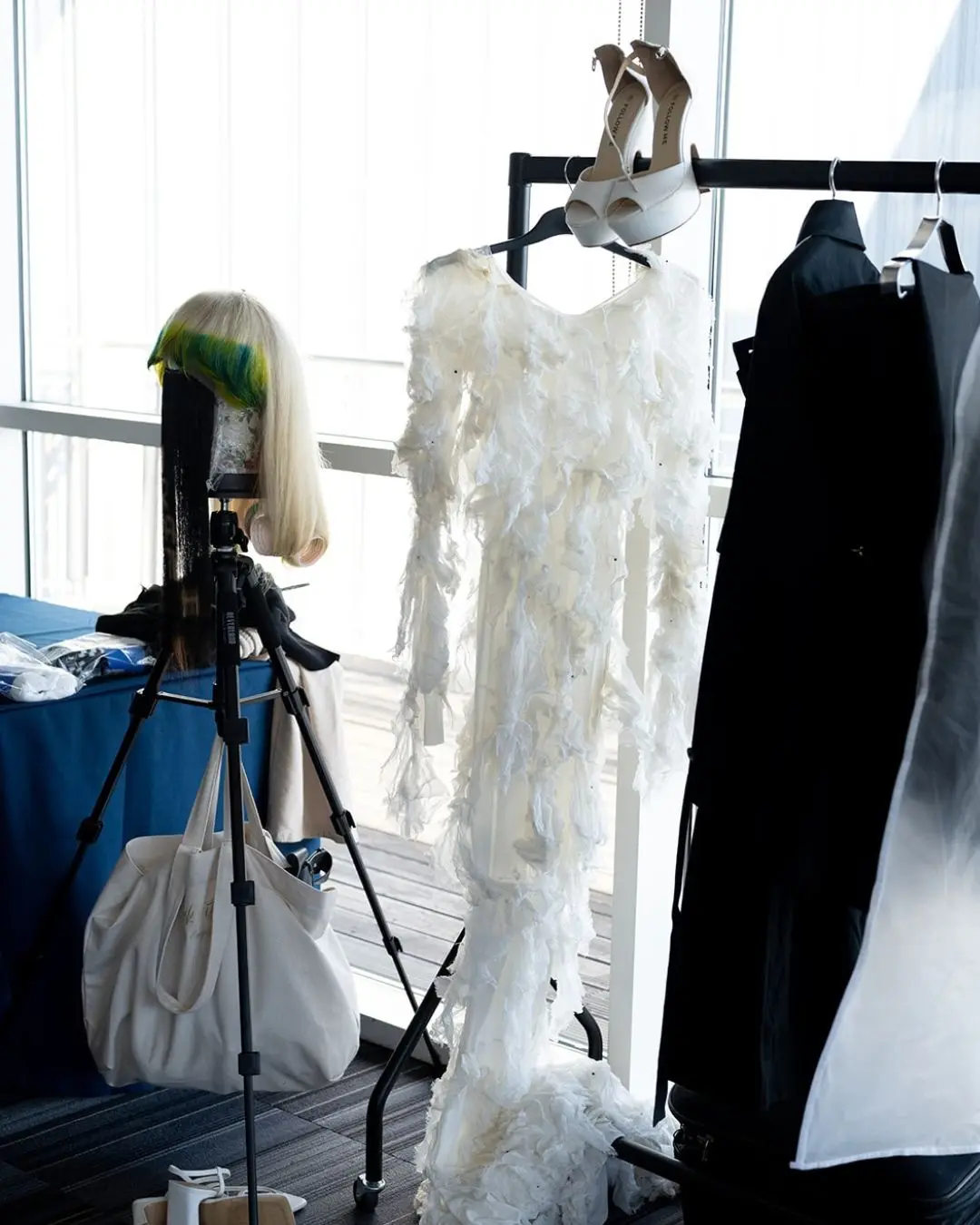 Costumes and wig backstage at Salon International.