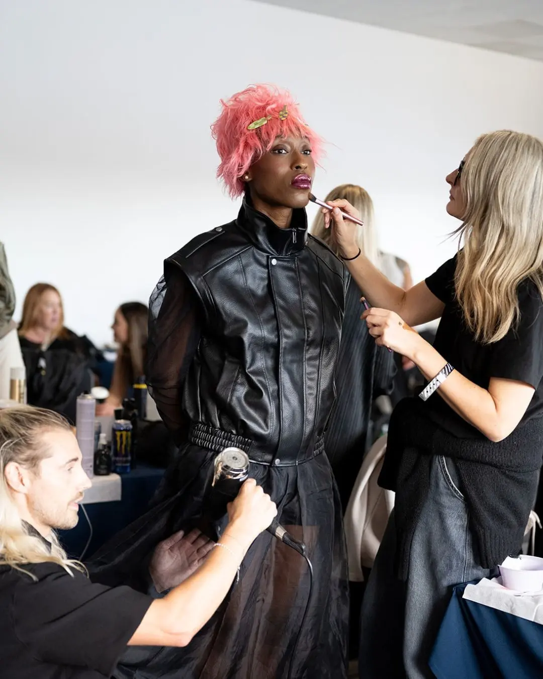 Model having make-up done at Salon International.