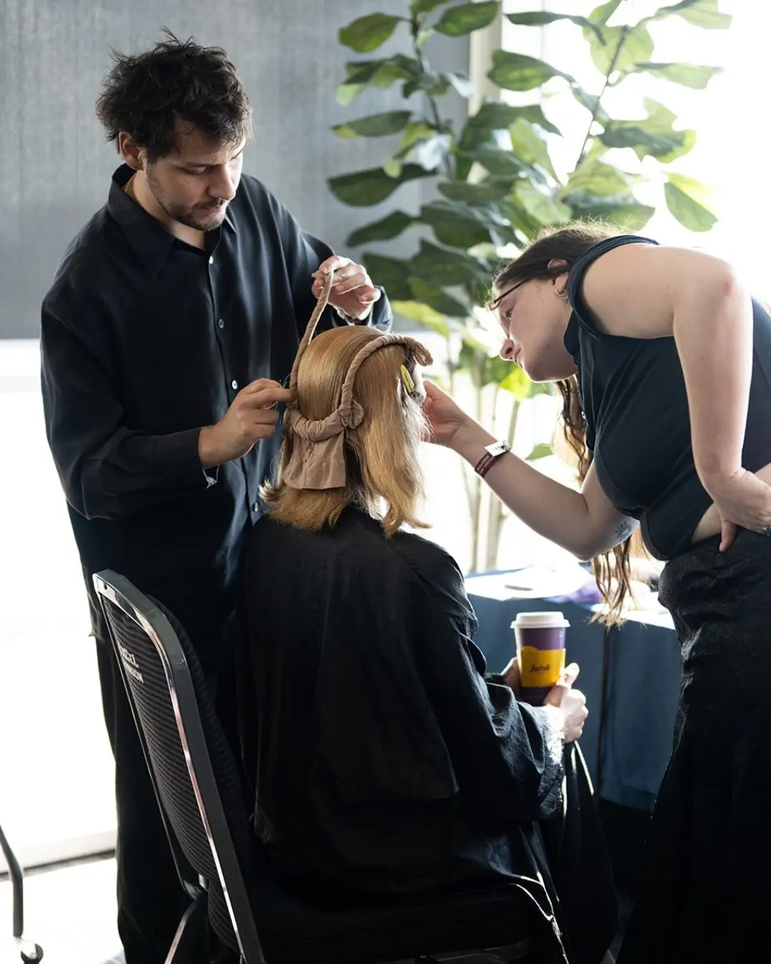 F.A.M.E. Team Finalists doing hair at Salon International.