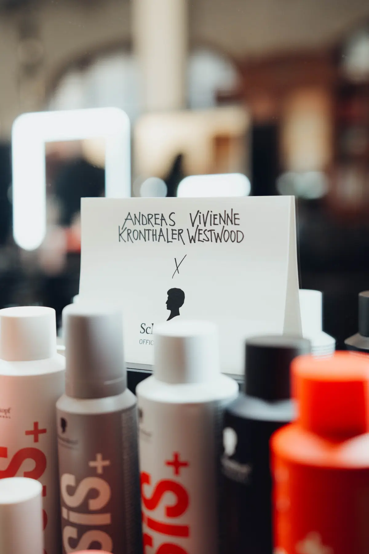 Selection of SKP OSIS products backstage at PFW SS27 Vivienne Westwood.