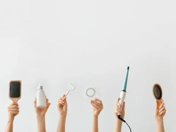 Hands holding hair tools