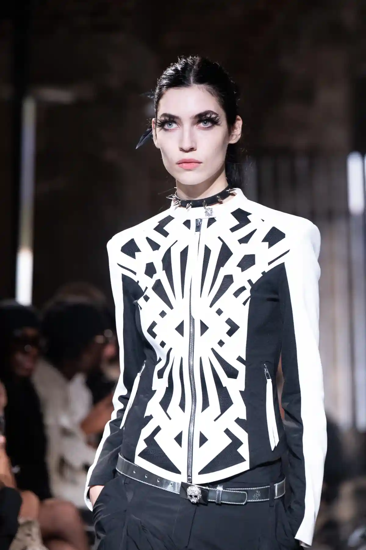Model with hair back and wearing monochrome atTONI&GUY X John Richmond SS27