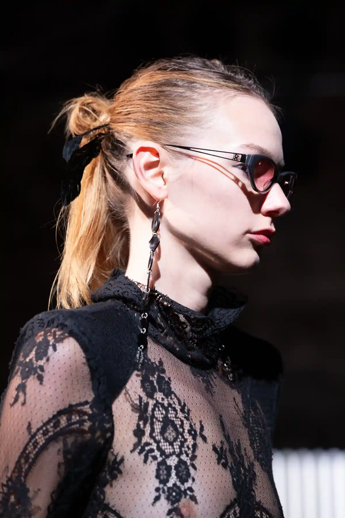 Model with blonde hair partially up at TONI&GUY X John Richmond SS27